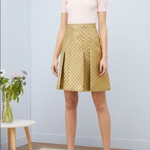SOLD. Gucci GG Lurex Pleated Aline Skirt In Gold